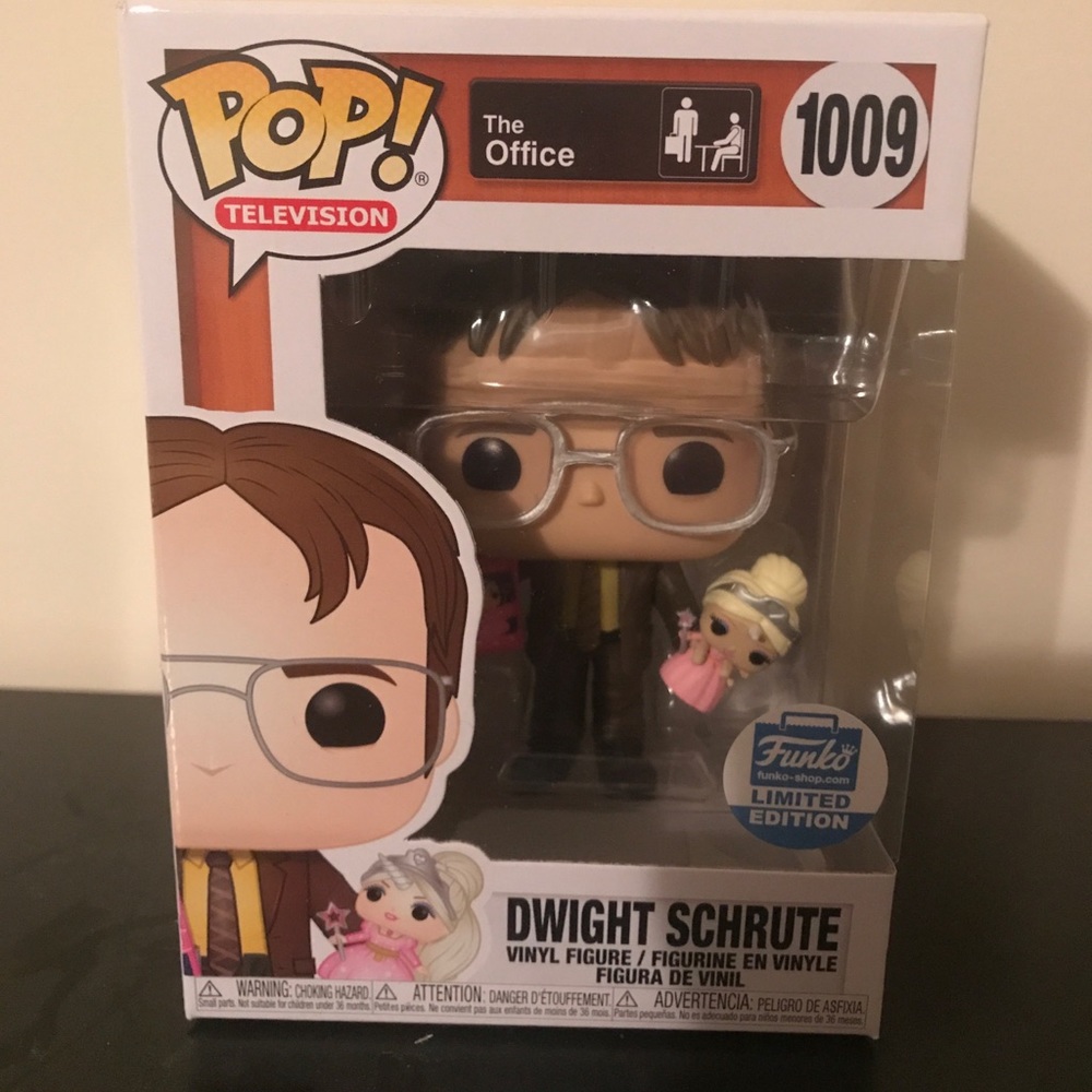 Dwight holding a doll funko